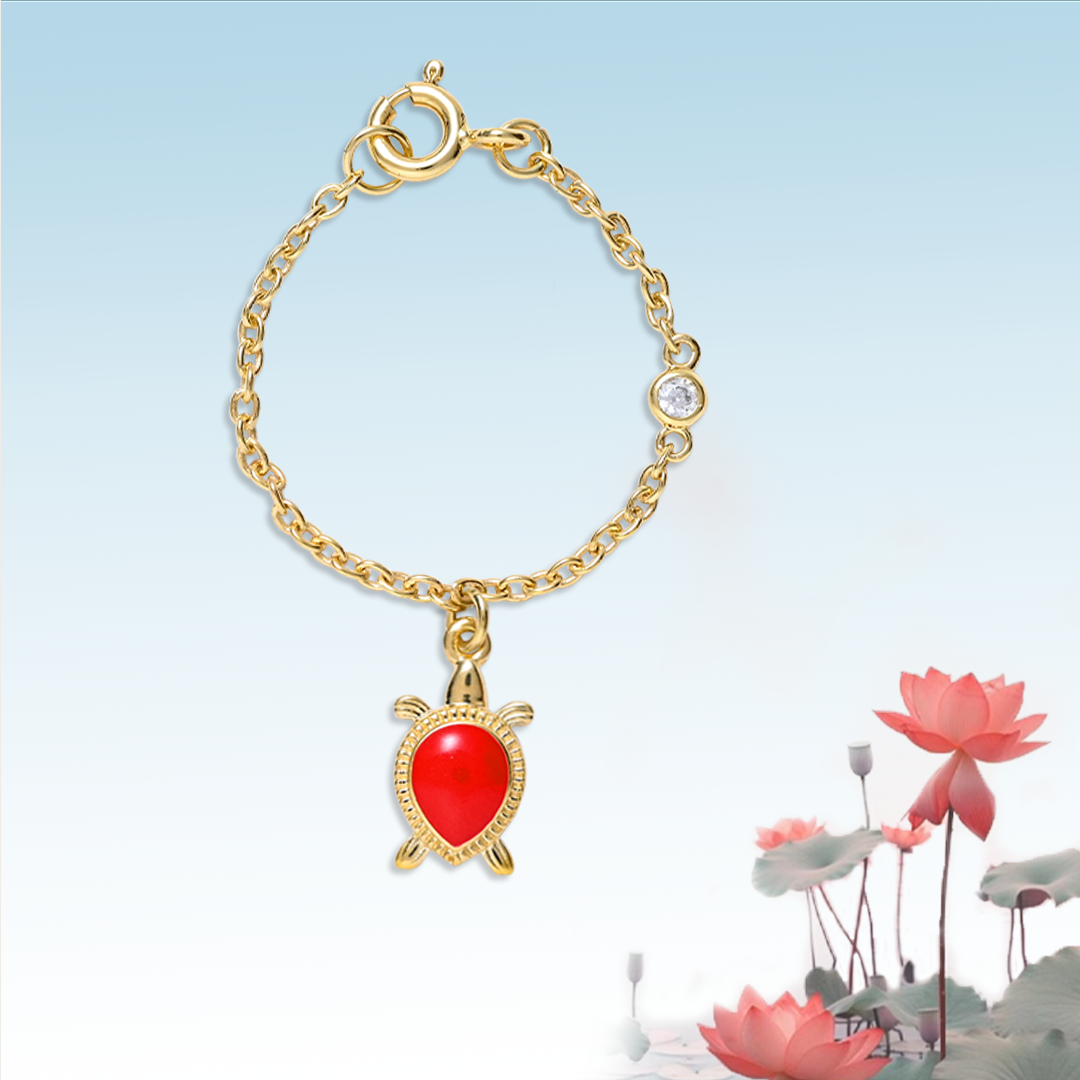 Lucky Turtle watch charm  in yellow gold with red enamel