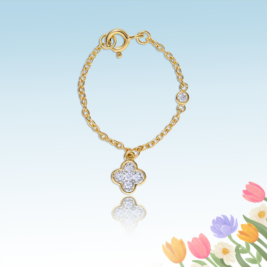 Lucky flower motife watch charm in 14kt yelllow gold with diamonds